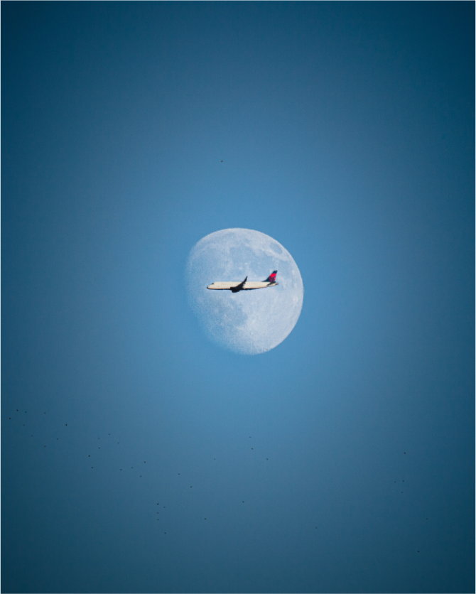 Main image Delta Jet Transiting the Moon Salt Lake City